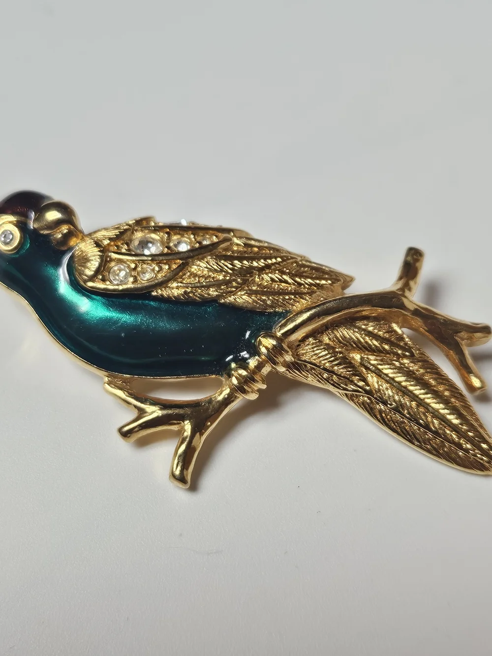 Avon Gold-Tone Parrot Brooch with Iridescent Teal Enamel and Crystals